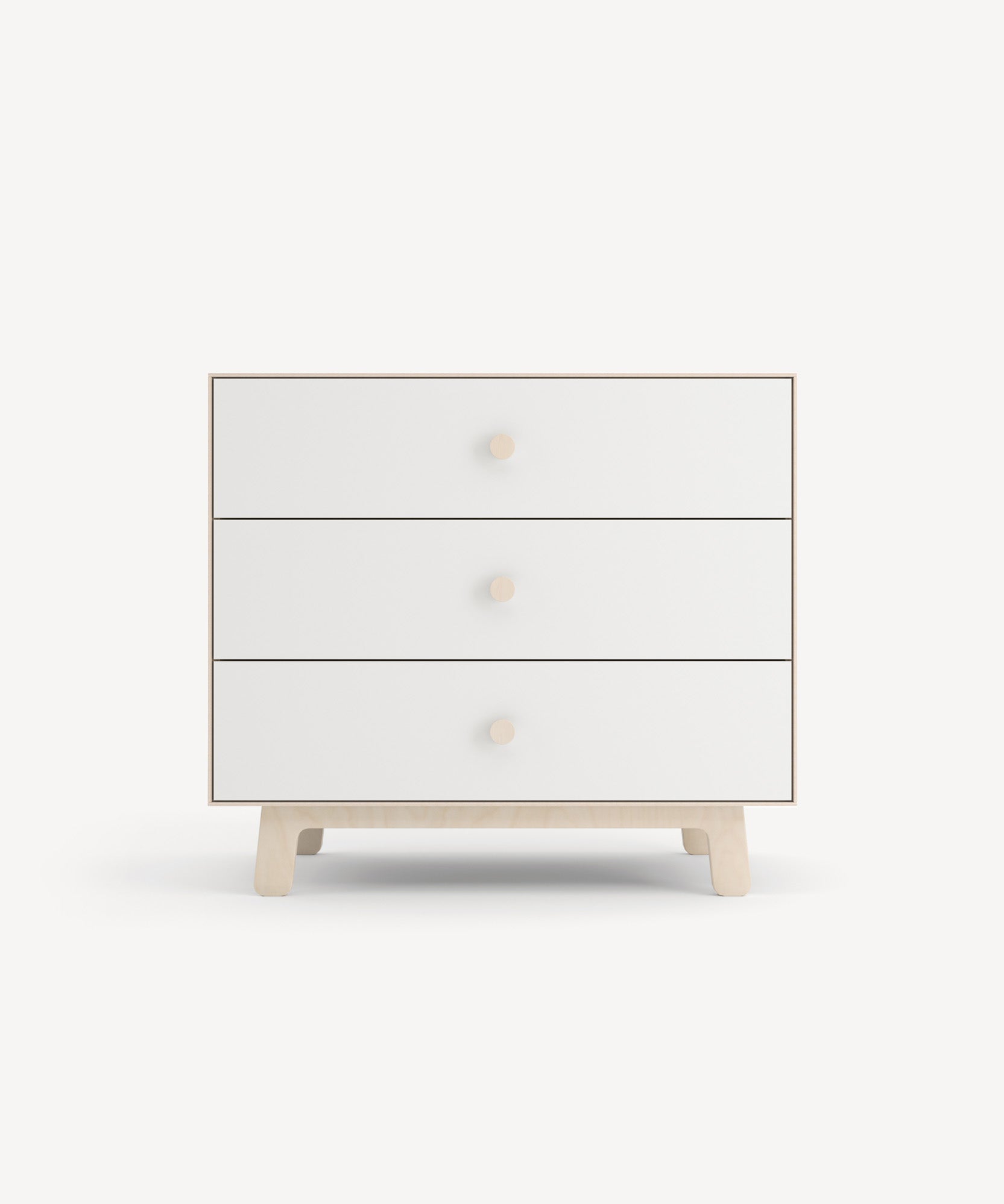 Sparrow 3-Drawer Dresser in minimalist white with wooden knobs and legs set against a light background.