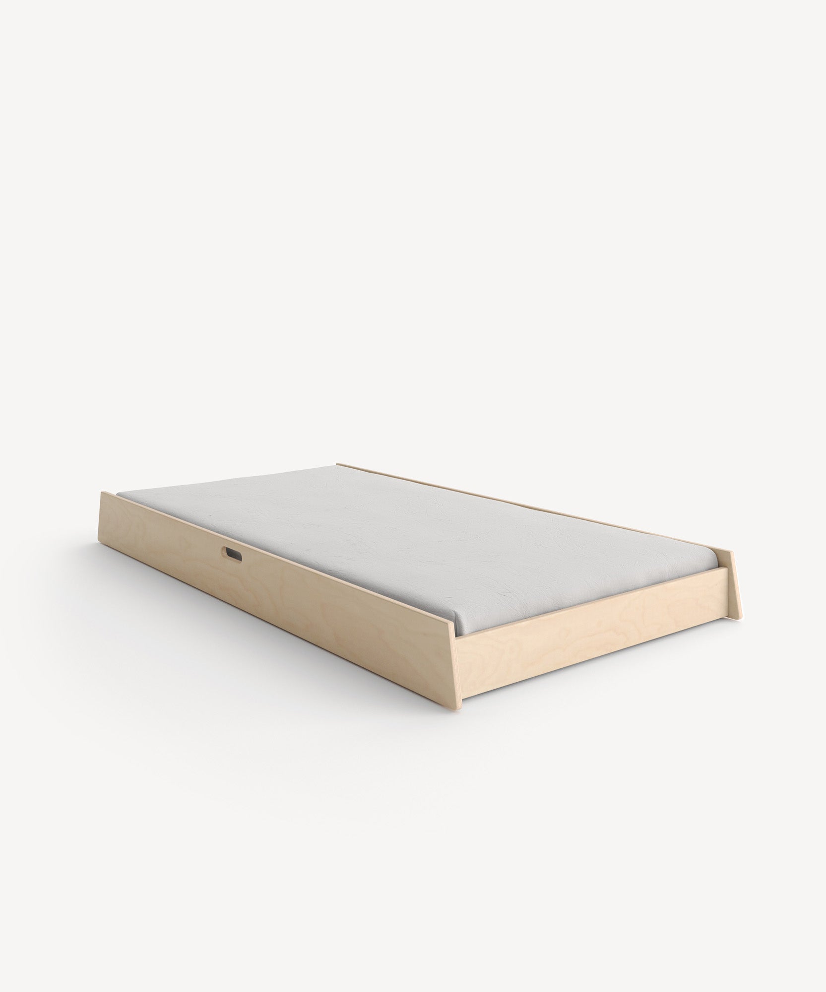 Sparrow Trundle Bed with a simple, modern wooden frame and a light gray mattress.