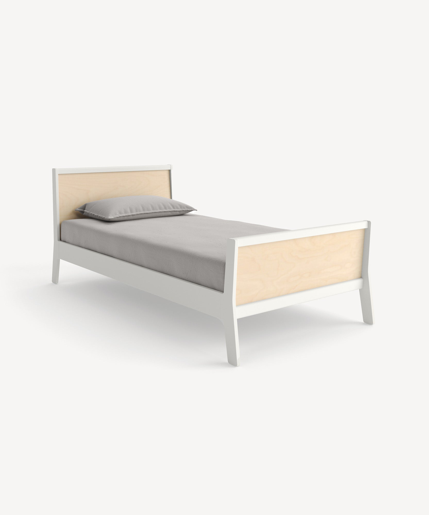 The Sparrow Twin Bed features a white wooden frame with a light wood headboard and footboard, complemented by a gray mattress and pillow, set against a white background.